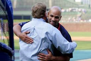 Illustration for article titled Albert Pujols Hugs Jim Hendry: A Photoplay In 10 Parts
